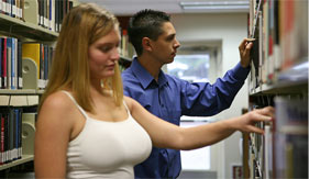 Students in a library, possibly studying to become doctors